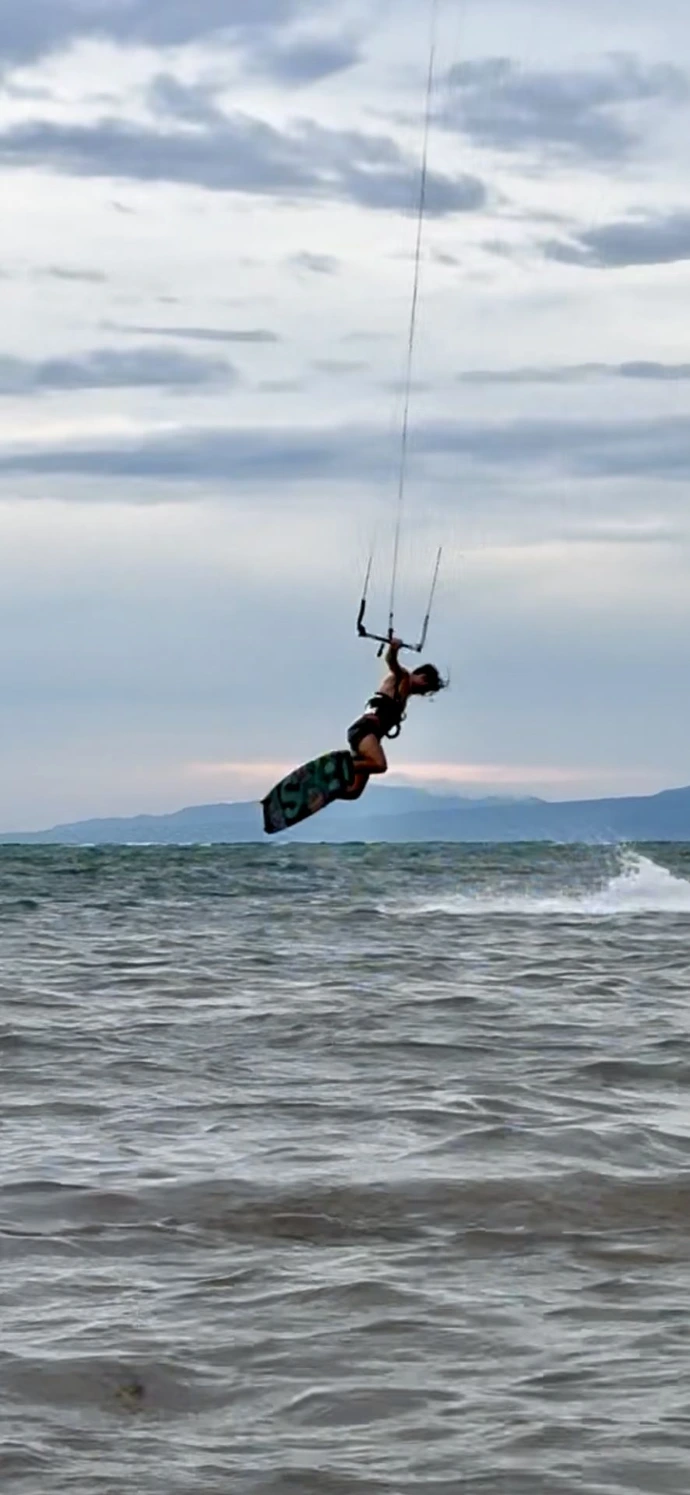 jumping kite surfer